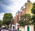 Old large apartment red brick houses in the area Kensington Olympia, London