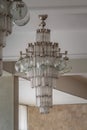 Old large Soviet glass chandelier in the style of modernism in the interior of the 1980s