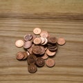 Old Latvian coins on a wooden background