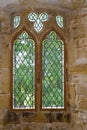 Old leaded abbey window Royalty Free Stock Photo