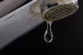 Old leaking faucet with stone and calcium sediments. Royalty Free Stock Photo