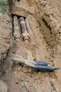 Old leaky pipes in the pit. Preparation for pipe replacement Royalty Free Stock Photo