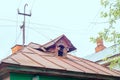 The old leaky roof of an old wooden house.