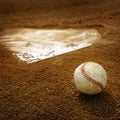 Old Leather Baseball on Field by Home Plate or Base Royalty Free Stock Photo