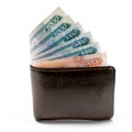 Old leather brown wallet with one and five thousand roubles banknotes isolated on white background Royalty Free Stock Photo