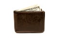 Old leather brown wallet with one hundred dollars banknote isolated on white background Royalty Free Stock Photo