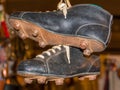 Old leather hanged soccer boots