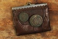Old leather purse with ancient chinks Royalty Free Stock Photo
