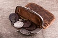 Old leather purse with silver coins Royalty Free Stock Photo