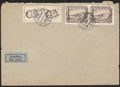 An old letter envelope and stamps. A worn letter envelope, stamps and stamp. Royalty Free Stock Photo