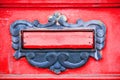 Old letterbox or mailbox in the gate door traditional way of delivering letters or mail to the house address close up Royalty Free Stock Photo