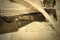 Old letters, inkpot, feather and photos Royalty Free Stock Photo