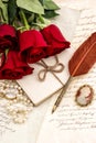 Old letters red rose flowers feather pen Valentined Day Love Royalty Free Stock Photo