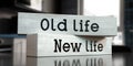 Old life, new life - words on wooden blocks Royalty Free Stock Photo