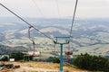 old lift hoist at top of mountains with amazing view, empty chairs chairlift, travel adventure concept