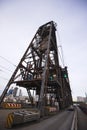 Old lifting metal structures bridge towers over river Willamette Royalty Free Stock Photo