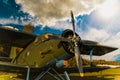 Old light airplane against the blue sky. Wartime combat aircraft Royalty Free Stock Photo