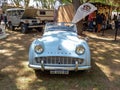 Old light blue sport 1950s Triumph TR3 A sport roadster in a park. Autoclasica 2022 classic car show