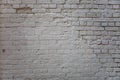 Old light brick wall with broken bricks. Space for text. Background Royalty Free Stock Photo