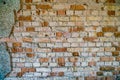 Old light broken red and yellow Bricks Wall Pattern decoration texture loft interior or exterior Royalty Free Stock Photo