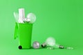 old light bulbs green recycling bin Royalty Free Stock Photo