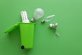 old light bulbs green recycling bin Royalty Free Stock Photo