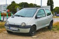 Old light grey Renault Twingo private compact car parked