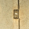 Old light switch on a grunge wall