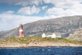 Old lighthouse Buholmrasa fyr and buildings on the island of Sonnaholmen on the coast of Norway