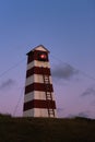 Old lighthouse in Denmark under a beautiful sunset