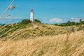 Old lighthouse Dornbusch on sunny summer day. Hiddensee, Baltic Sea. Royalty Free Stock Photo