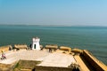 The old lighthouse on the famous tourist spot of fort diu in gujarat, overlooking the arabian sea