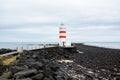 The old lighthouse in Gardur, Iceland. Beautiful landscape in Iceland. Atlantic ocean.
