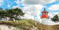 Old lighthouse Gellen on sunny summer day. Hiddensee, Baltic Sea. Royalty Free Stock Photo