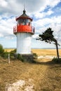 Old lighthouse Gellen on sunny summer day. Hiddensee, Baltic Sea. Royalty Free Stock Photo