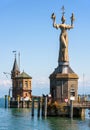 Old lighthouse and statue of Imperia in harbor of Constance, Germany Royalty Free Stock Photo