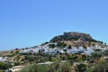 Old Lindos. Greece. White houses on the mountain. Mediterranean views. Sunny Summer