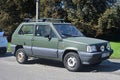 Old little green compact city veteran small car Fiat Panda I parked