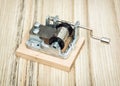 Old little music box on the wooden background Royalty Free Stock Photo