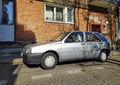 Old little silver grey Italian compact hatchback veteran small car Fiat Tipo 1.4 1988 parked Royalty Free Stock Photo