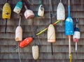 Old lobster buoys hanging on the wall Royalty Free Stock Photo