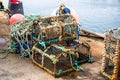 Pile of old lobster traps on a pier Royalty Free Stock Photo