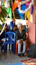 Indian/Nepali local men sitting on chair and talking