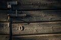 Old lock on barn door in afternoon light Royalty Free Stock Photo