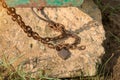 Old lock and rusty chain on a iron boat Royalty Free Stock Photo