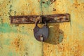 An  old  lock on a rusty door Royalty Free Stock Photo