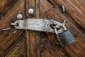 the old lock on the wooden brown door Royalty Free Stock Photo