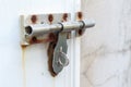 Old lock on wooden door Royalty Free Stock Photo