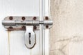 Old lock on wooden door Royalty Free Stock Photo