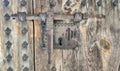 Old lock on wooden gate in Los Serrano tower in Valencia